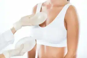 Compating two different breast implants on the patient